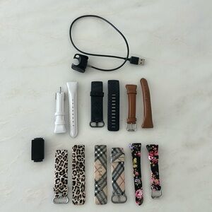 Fitbit charge 4 with six bands and charger, EC